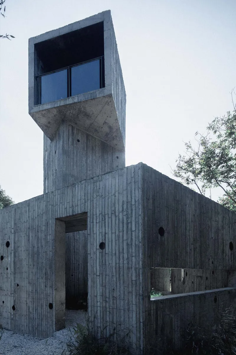 Close view of the cantilevered observation room atop the board-formed concrete tower at dusk
