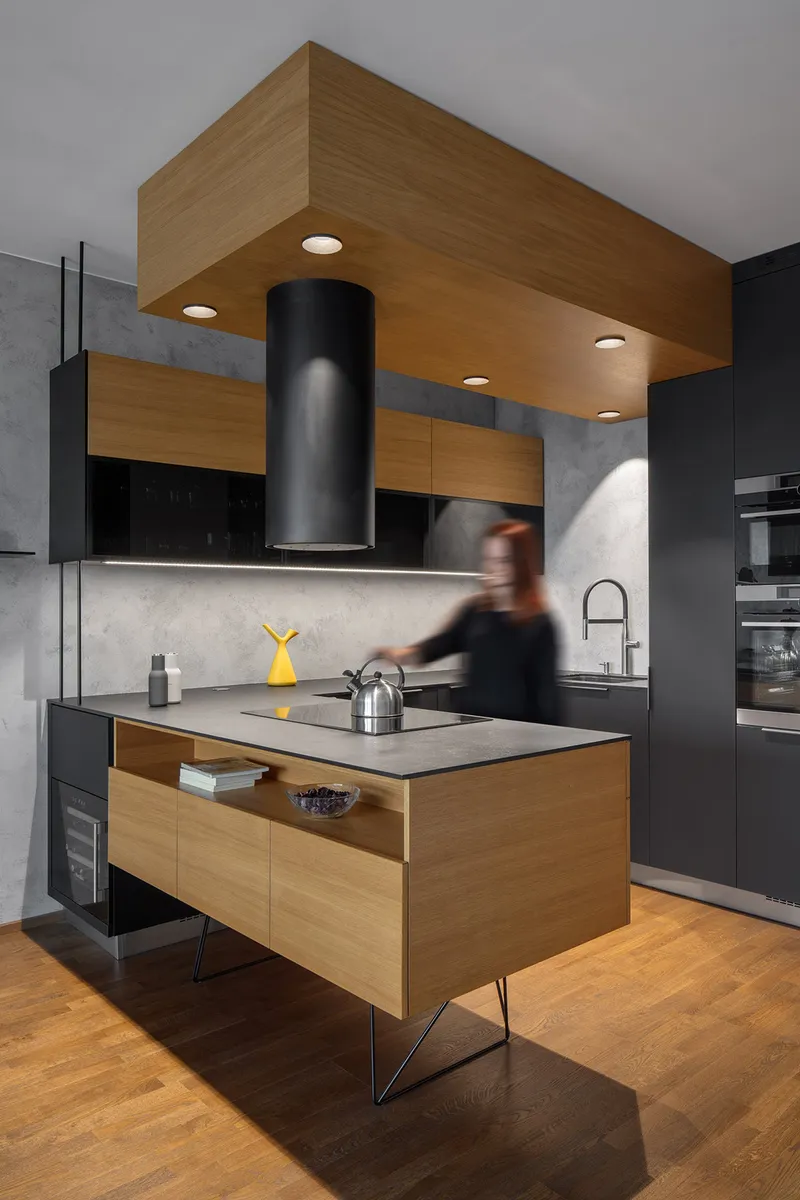 Floating kitchen island defines a light, open minimalist layout