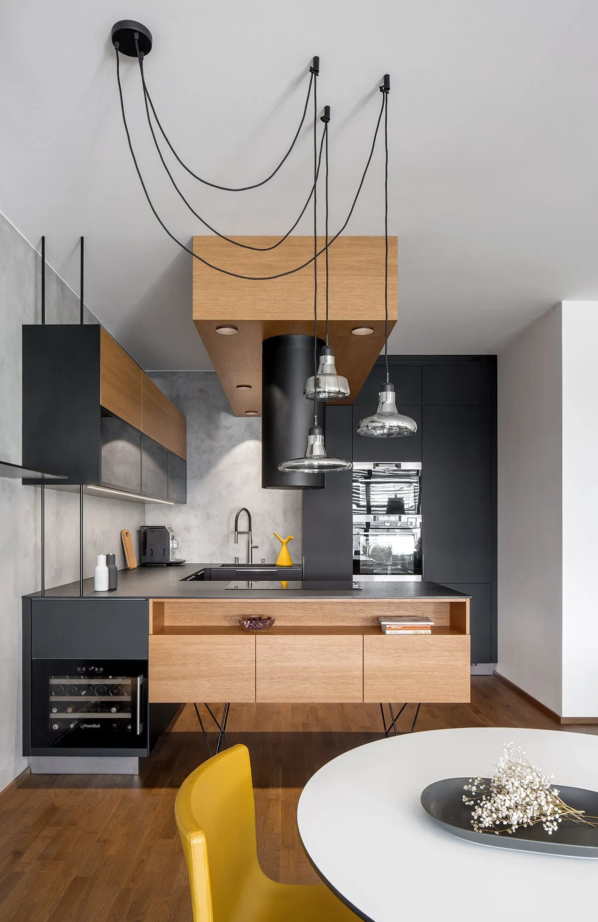 Modern Minimalist Apartment Interior Design: A Black Kitchen Concept in Prague