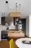 Modern Minimalist Apartment Interior Design: A Black Kitchen Concept in Prague