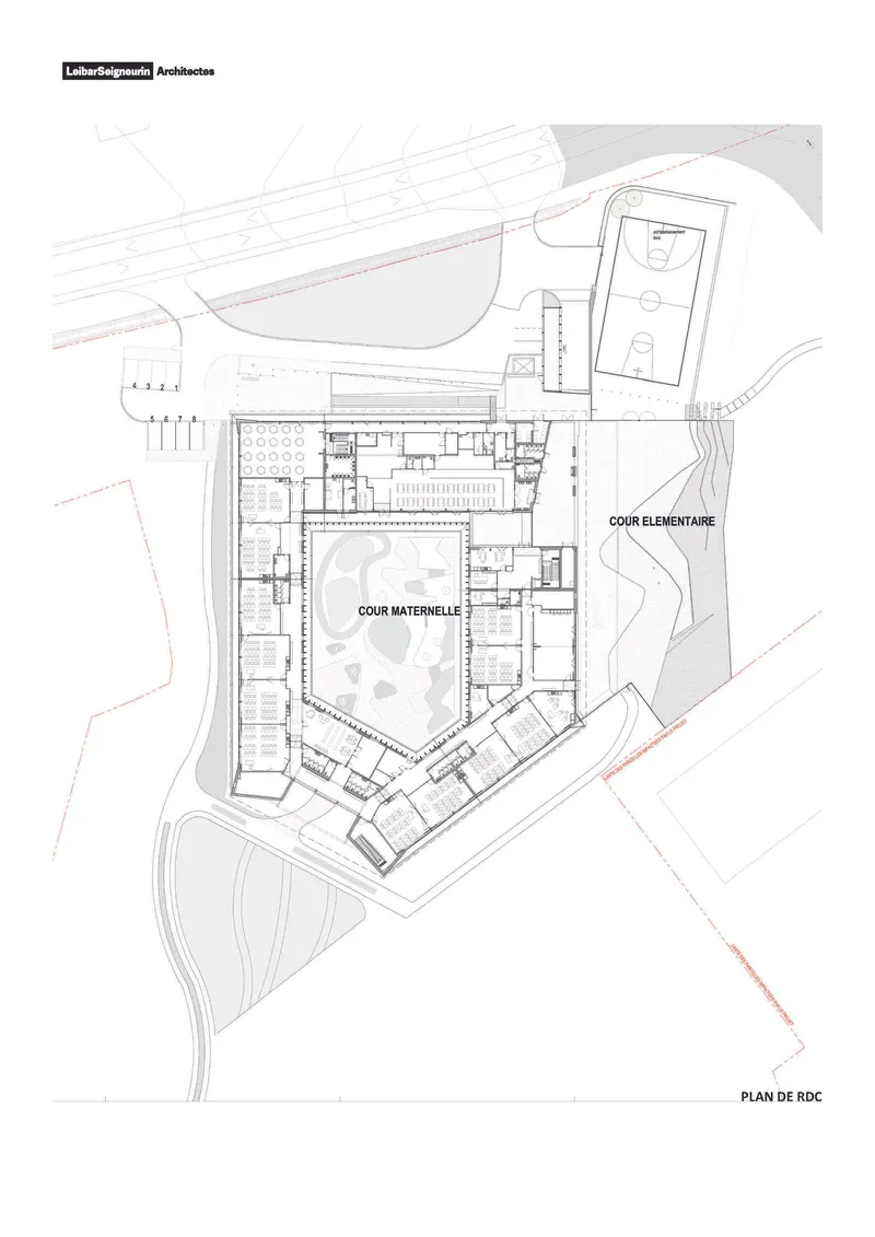 Ground floor plan drawing showing classroom wings arranged around two courtyards and a sports field