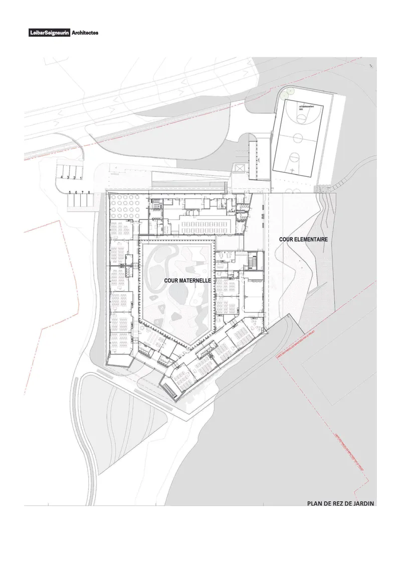 Ground floor plan drawing showing classroom wings with two courtyards and adjacent sports field