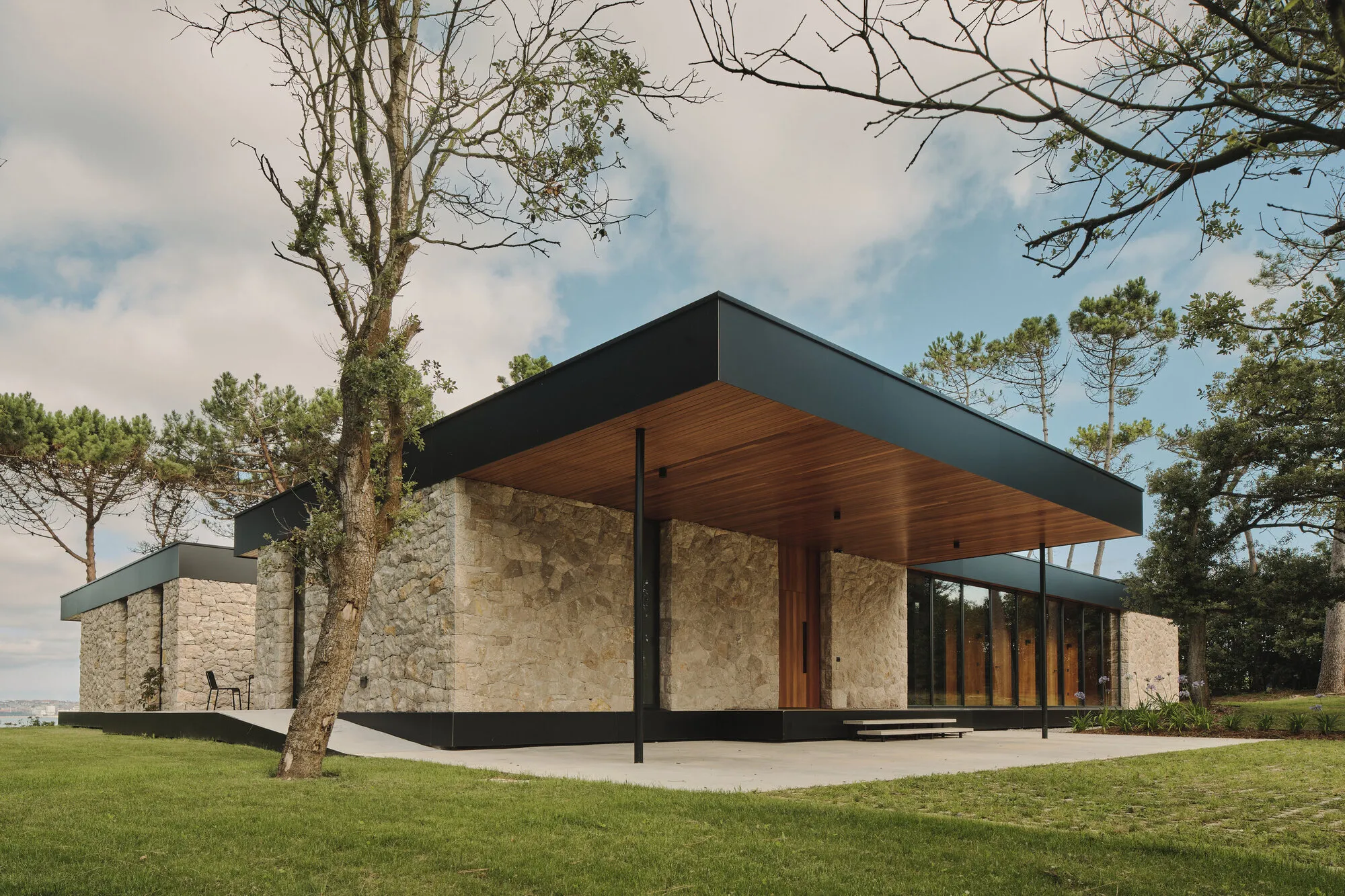 Zooco Estudio Reinvents Cantabrian Vernacular with a Stone and Timber Coastal House in Santander