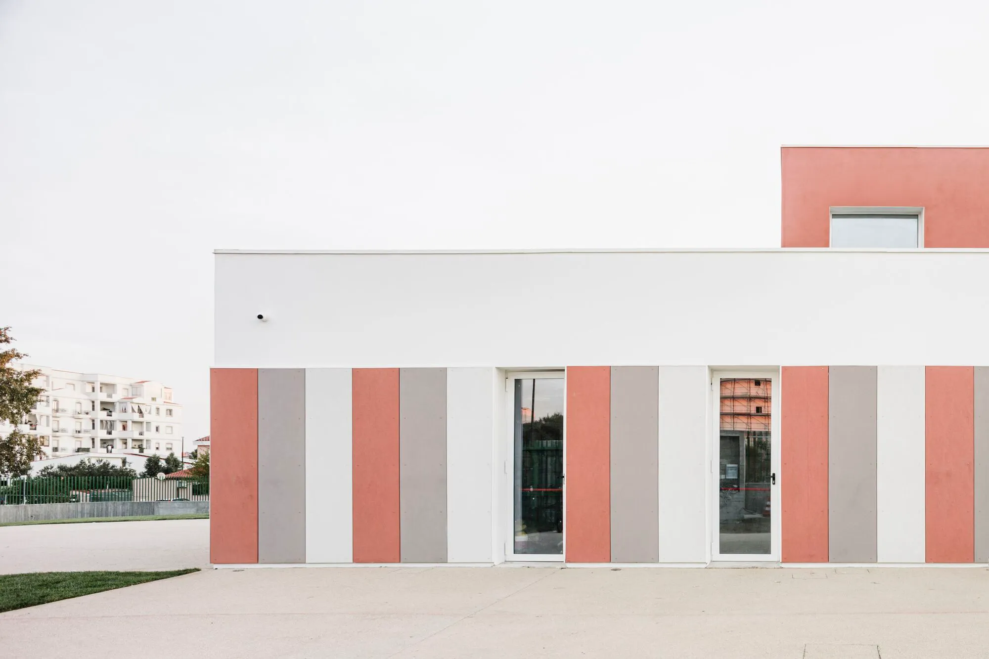 LERUA Studio Wraps an Olbian Nursery in Terracotta Stripes and Civic Ambition