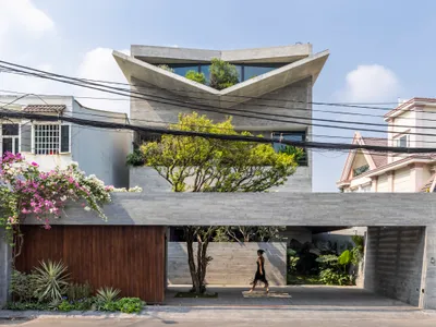 23o5Studio Folds Concrete and Canopy into a Layered Urban House in Ho Chi Minh City
