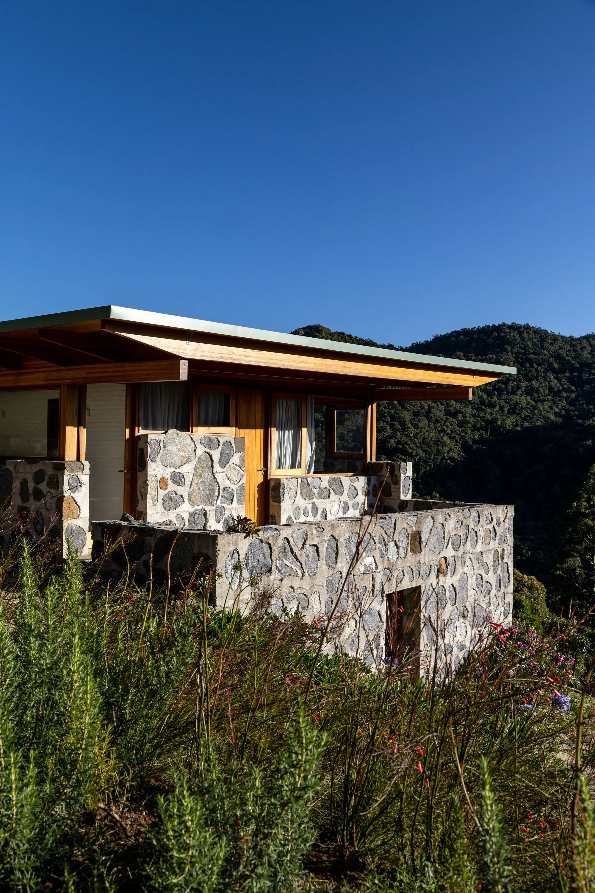 Cicero Ferraz Cruz and Fábio Mosaner Build a Mountain House as a Ruin Reborn in Timber and Stone