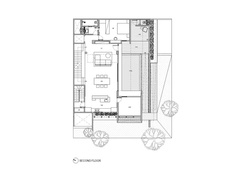 Second floor plan showing open living and dining spaces with adjacent pool terrace