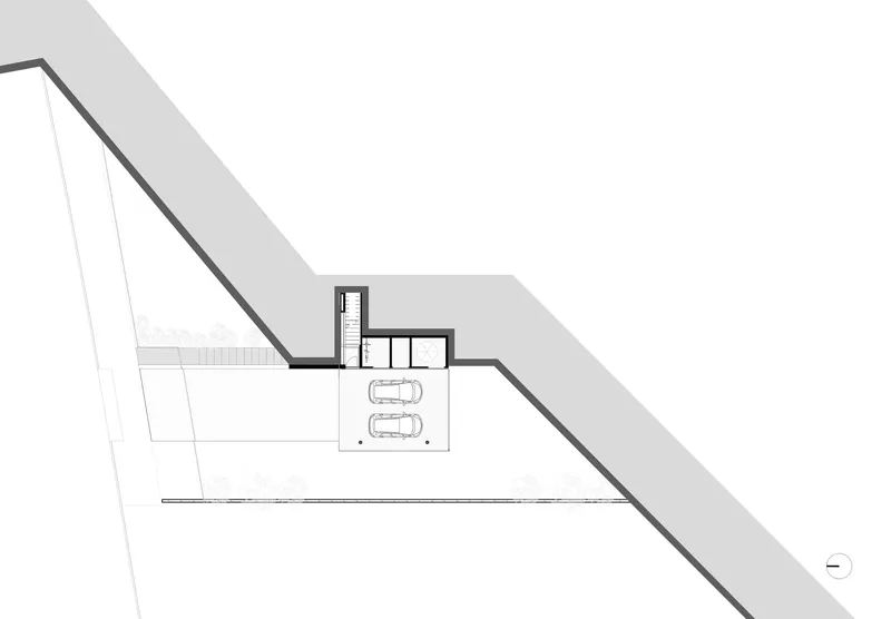 Roof plan drawing showing a triangular site with sunken garage and upper level volumes