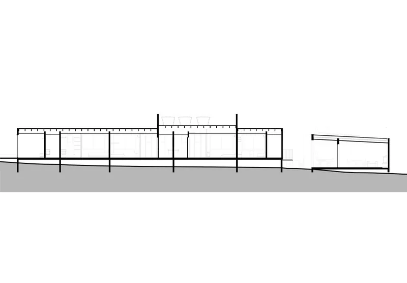 Longitudinal section drawing showing a linear single-story structure with flat roof and columnar supports