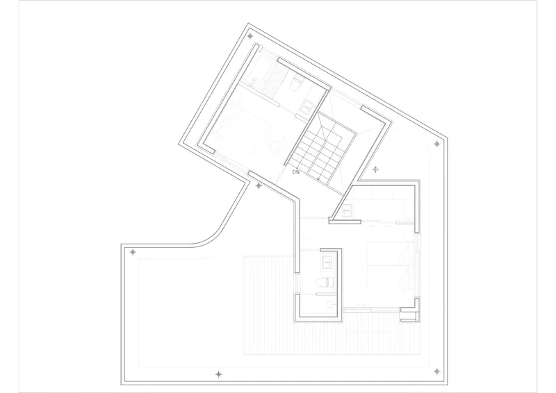 Floor plan drawing showing irregular geometry with curved exterior wall and central service core