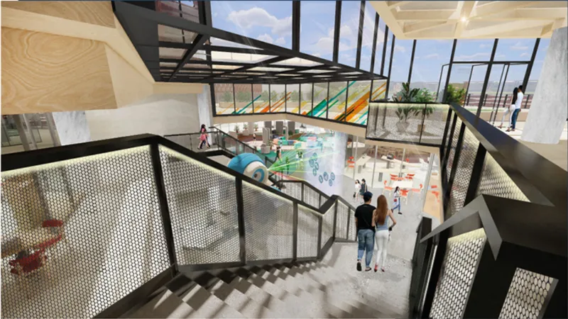 Multi-level atrium fostering visual connectivity and fluid movement across learning zones.