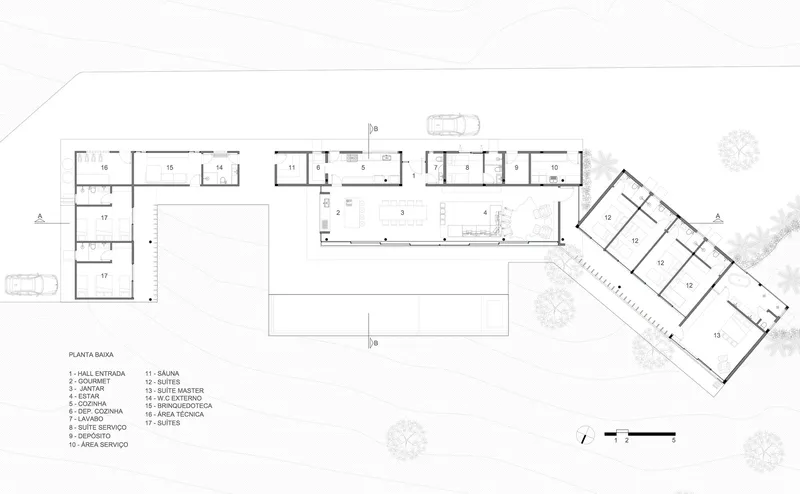 Floor plan drawing depicting linear and angled wings organized around a central courtyard with pool