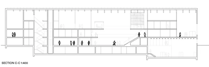 Longitudinal section drawing revealing interior split levels with figures and a stepped connection between spaces