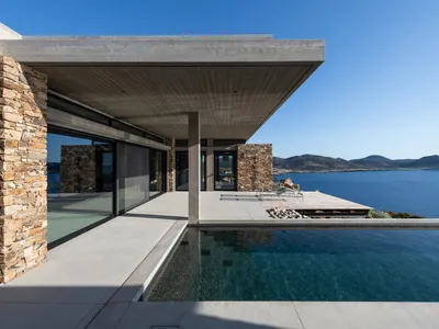 Biris-Tsiraki and Associate Architects Carve a Concrete-and-Stone Summerhouse into an Antiparos Cliff