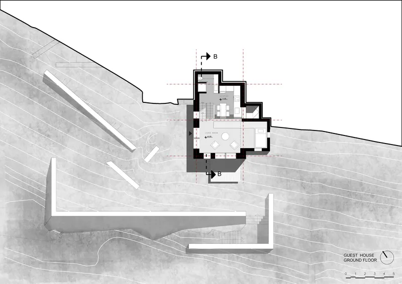 Ground floor plan drawing showing a house with linear retaining walls on a sloped site