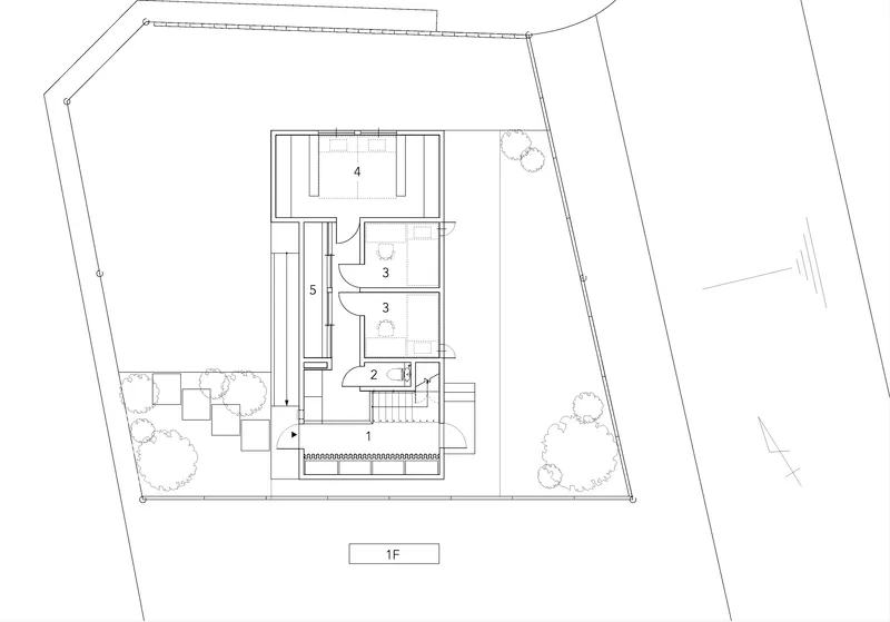 First floor plan drawing showing interconnected rooms and landscaped site boundaries
