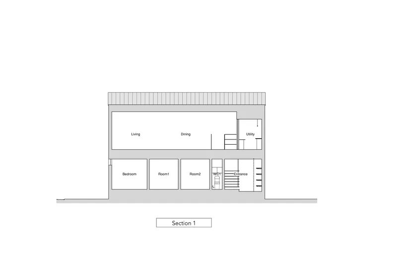 Section drawing showing the two-level spatial arrangement with living spaces above and bedrooms below