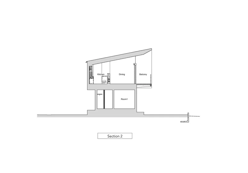 Section drawing illustrating the curved roof profile and split-level interior with labeled rooms