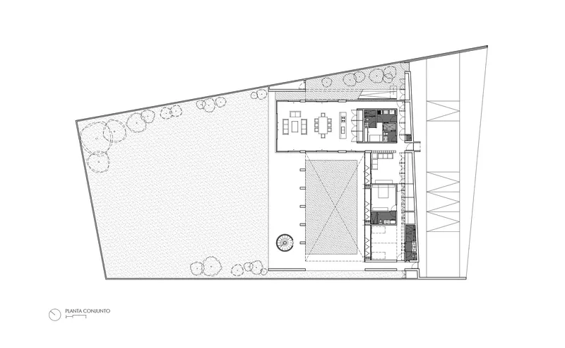 Floor plan drawing showing an angled trapezoidal lot with central pool and flanking interior spaces