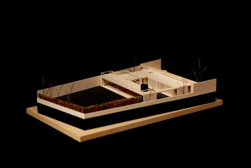 Physical model from opposite angle revealing the angled roof forms and open courtyard space