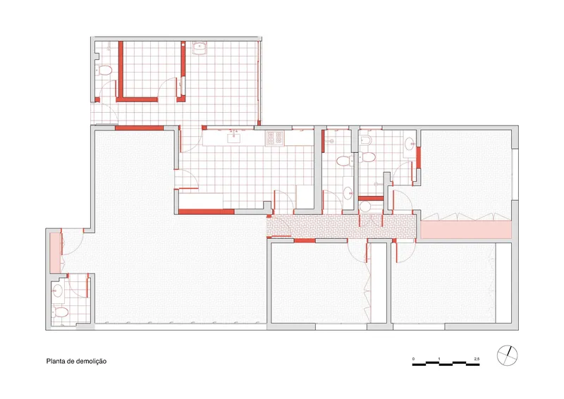Demolition plan drawing with red-highlighted walls indicating existing partitions to be removed