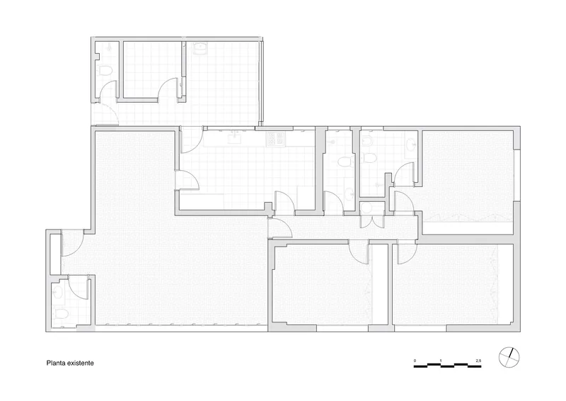 Existing floor plan drawing showing the original apartment layout with compartmentalized rooms and circulation paths