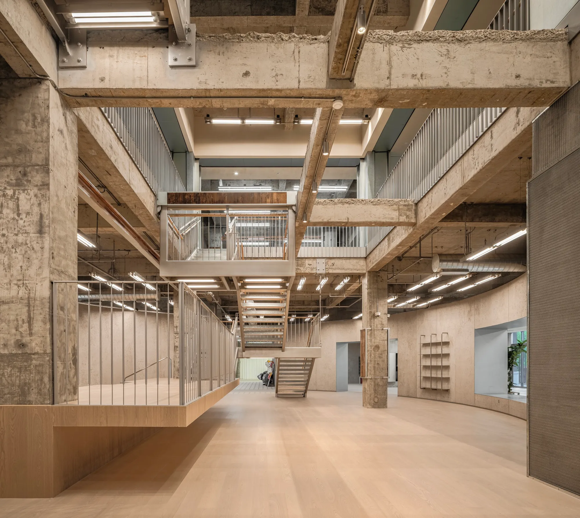 Vari Architects Turns a Forgotten Chongqing Office Building into a Raw Concrete Cultural Hub