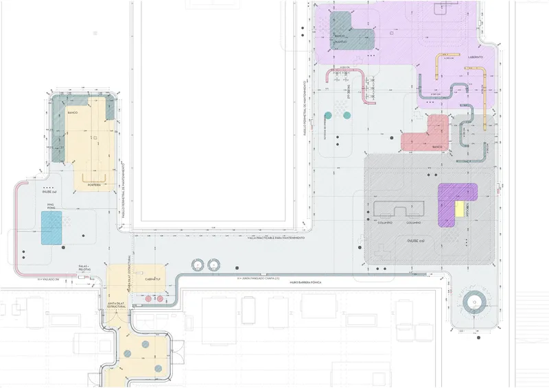 Floor plan drawing showing color-coded rooms arranged around a central courtyard with circulation paths