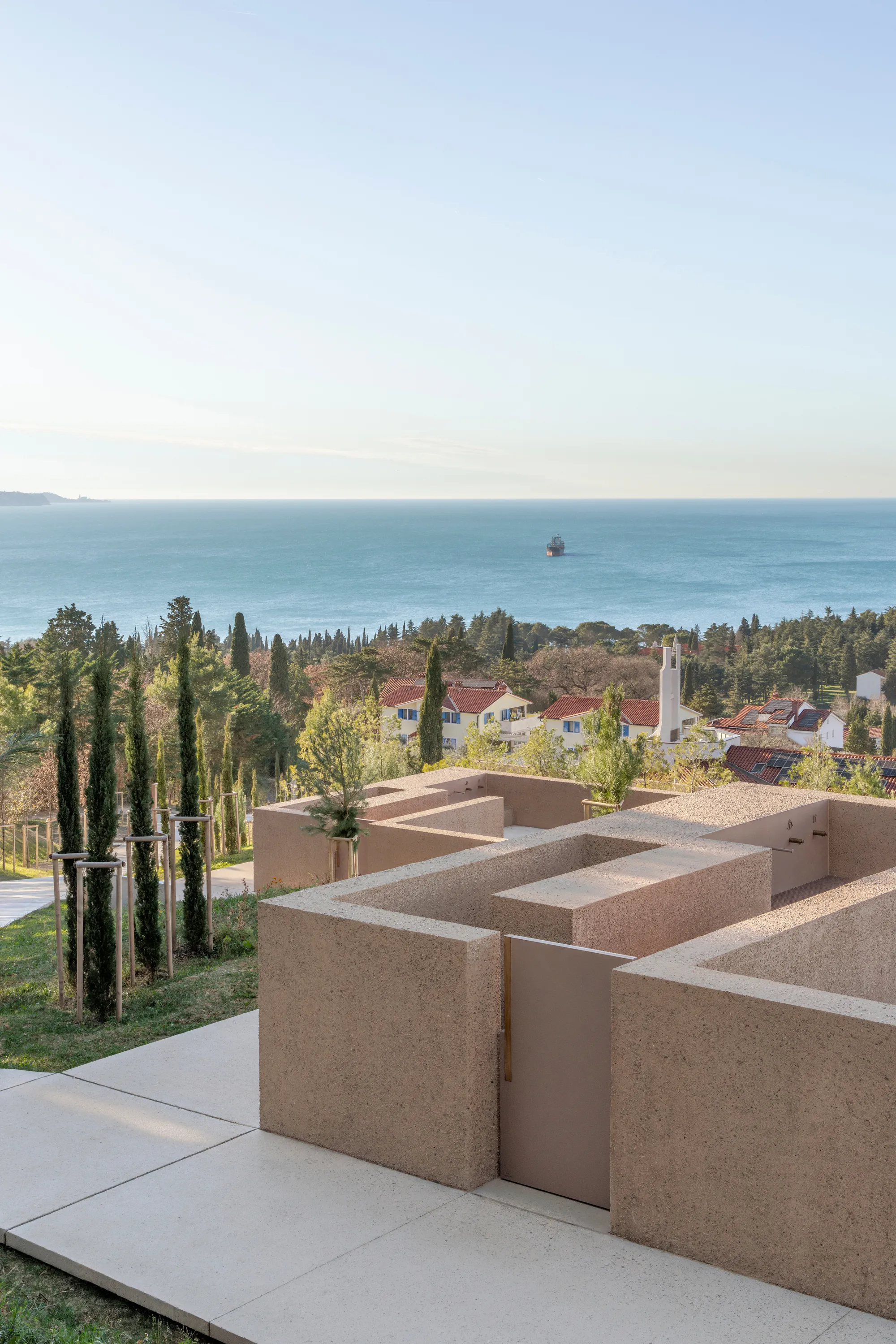 void arhitektura Terraces a Slovenian Cemetery into a Forest Ridge Above the Bay of Trieste
