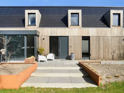 Lautenbag Architectuur Tucks a Modern Barn House Behind an 18th-Century Monument in Friesland