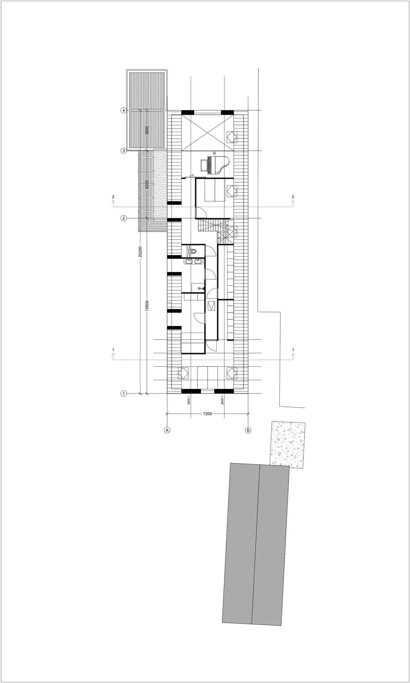 Upper floor plan drawing showing bedroom spaces and a central staircase with terraces