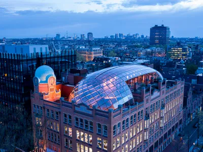 ZJA Crowns Amsterdam's 1911 Diamond Exchange with a Faceted Glass Dome