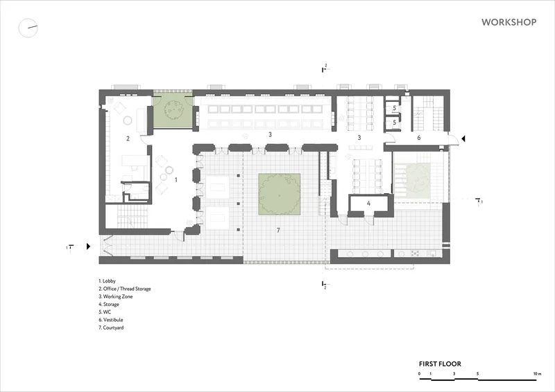 First floor plan showing open working zone with central courtyard and adjacent service spaces