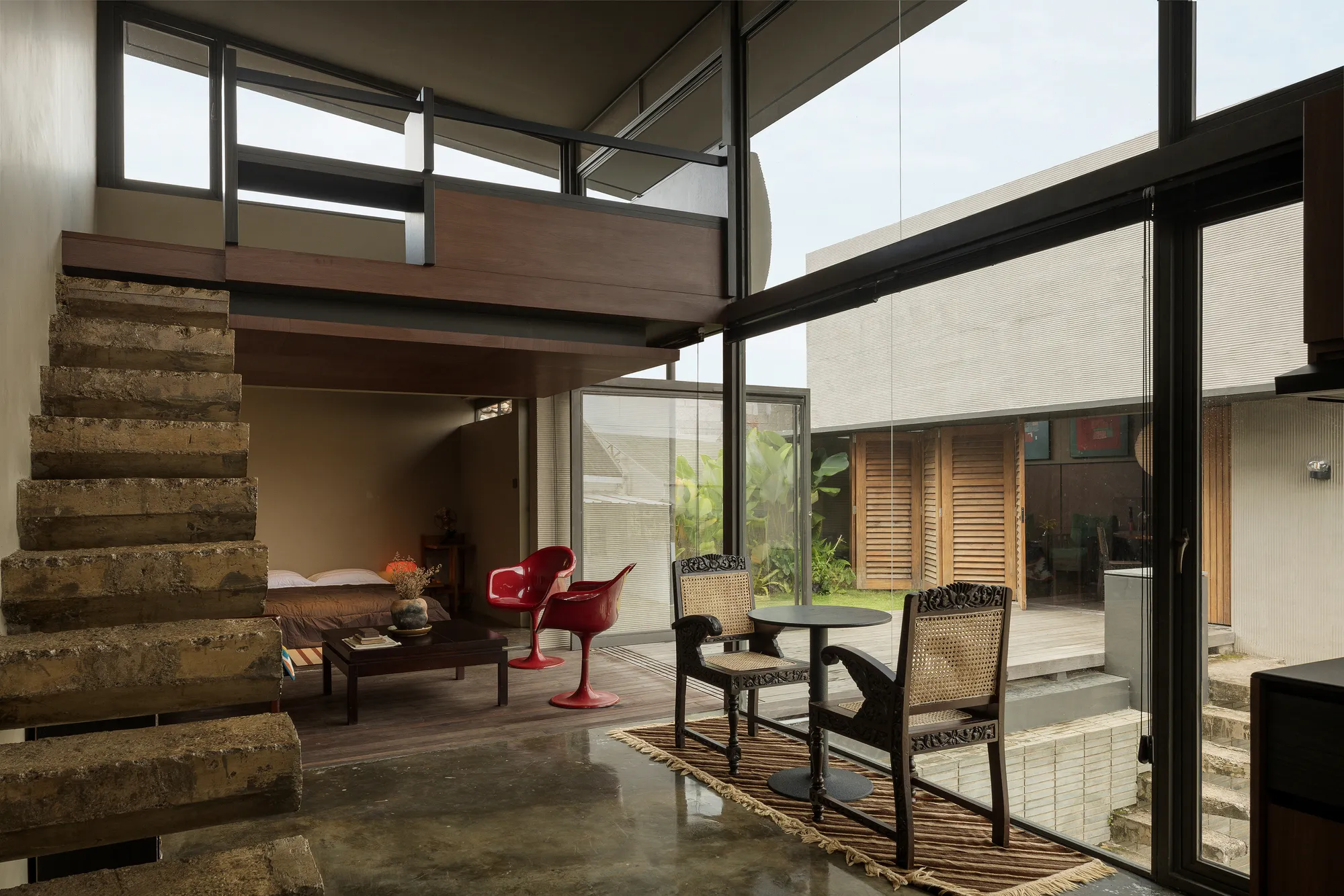 suatudio Splits a Multigenerational Home into Interlocking Concrete Volumes in West Java