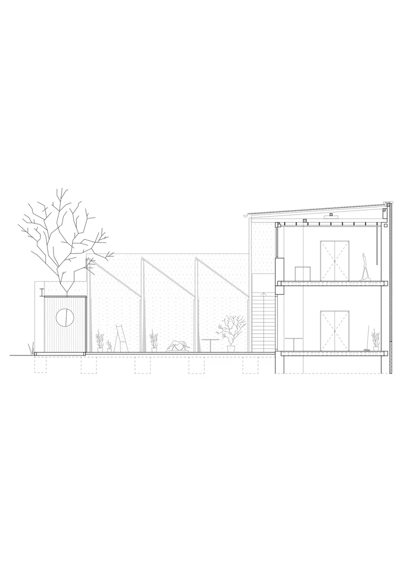 Section drawing revealing two levels with stairs and a sloped roof above an enclosed courtyard