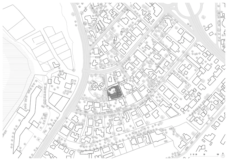 Site plan drawing showing the building footprint within the surrounding residential neighborhood and street grid