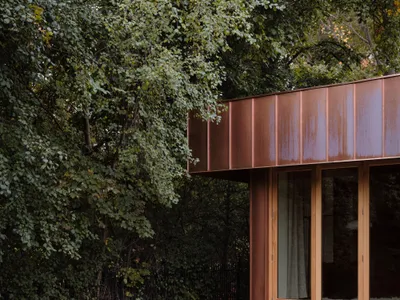Fabrication Studio Wraps a 60 m² Garden Suite in Copper at the Edge of a Toronto Park