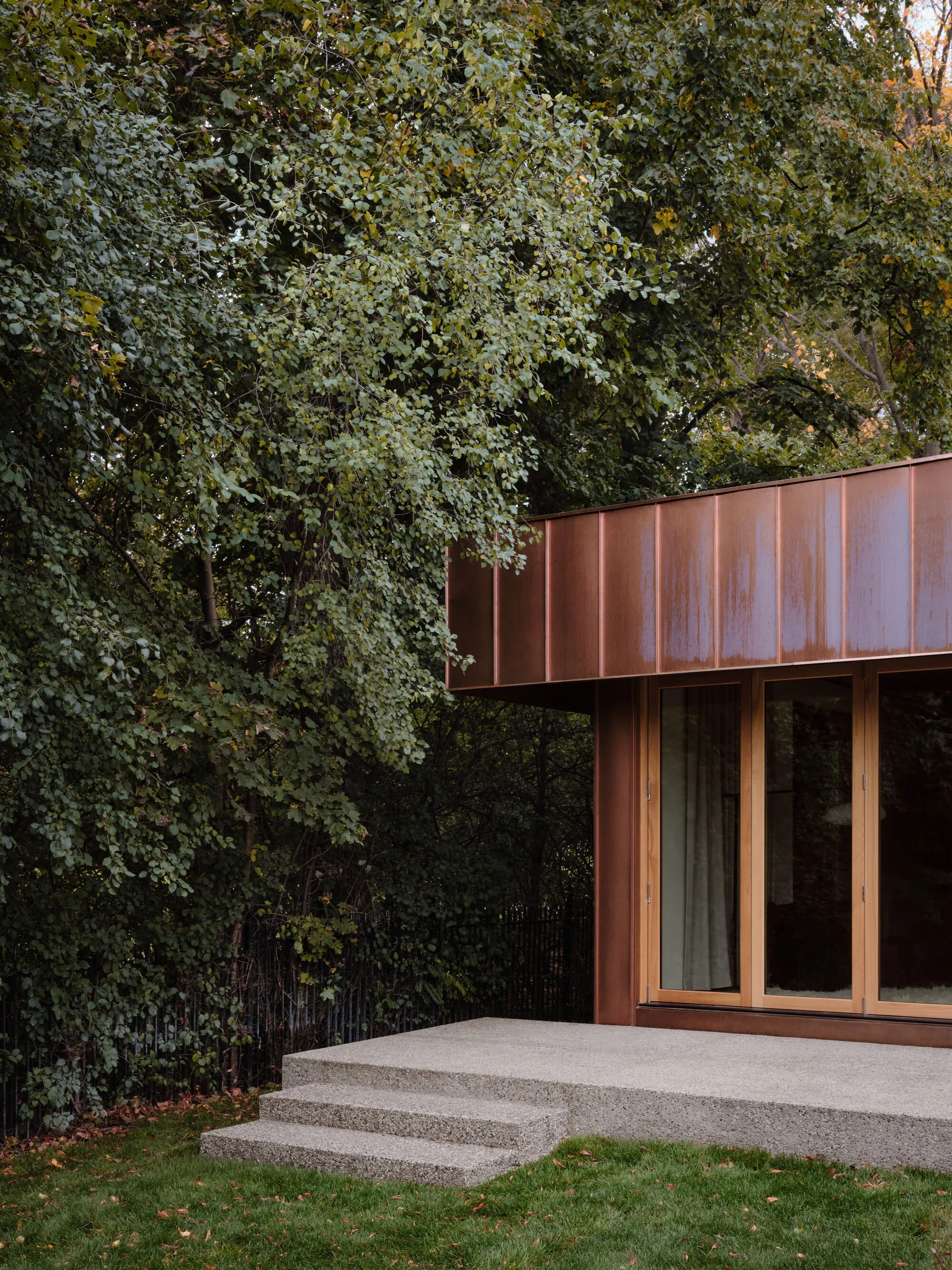 Fabrication Studio Wraps a 60 m² Garden Suite in Copper at the Edge of a Toronto Park