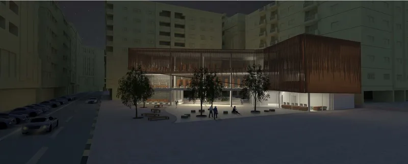 Night view highlighting the facade’s permeability and the library’s role as an active civic landmark