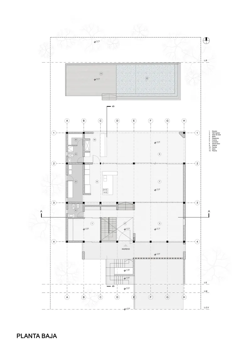 Ground floor plan drawing showing living spaces arranged around central staircase and rear terrace
