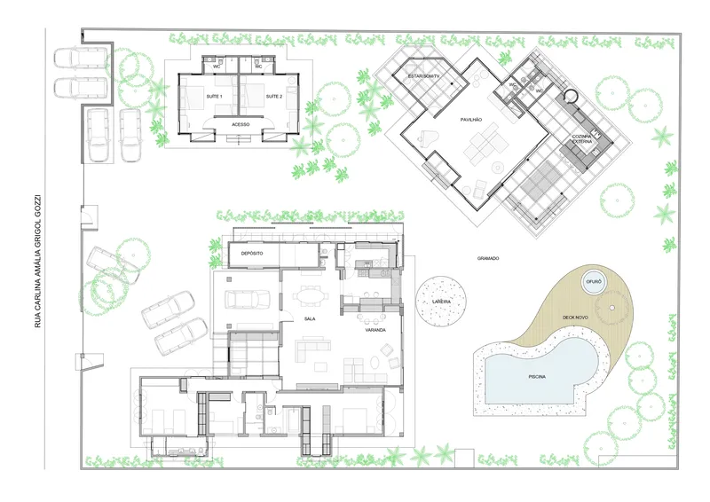 Site plan drawing showing three building volumes, pool with curved deck, and surrounding planted landscape