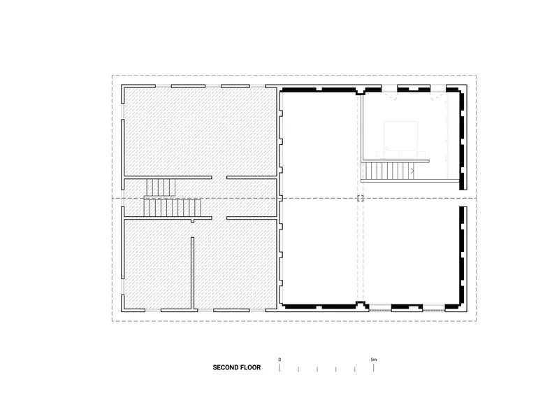 Second floor plan drawing showing the layout of rooms and staircases with dashed renovation boundaries