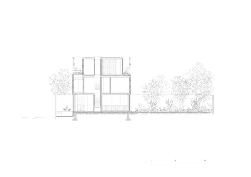 Section drawing showing a three-storey structure with a central staircase and adjacent trees