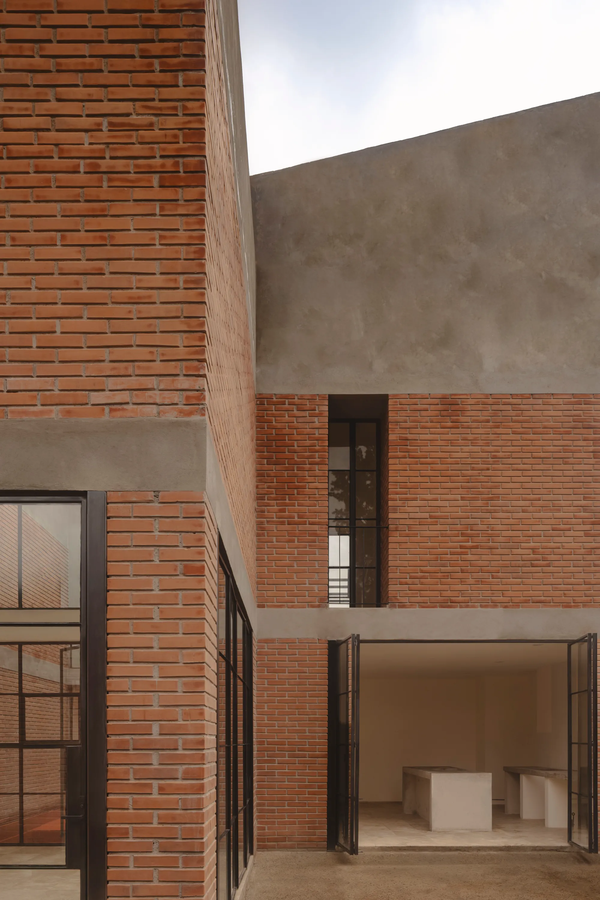 TALC Builds a Brick House in Three Bodies Around a Sequence of Courtyards in Mexico City