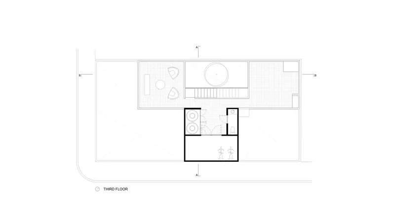 Third floor plan drawing showing bathroom layout and central circular stairwell
