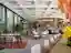 AT Interiors Revives a 1960s Almaty Landmark as the Swan-Themed Aqqu Central Café