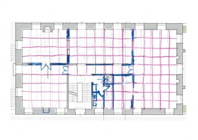Floor plan drawing with pink and blue structural grid overlay indicating load-bearing walls and columns