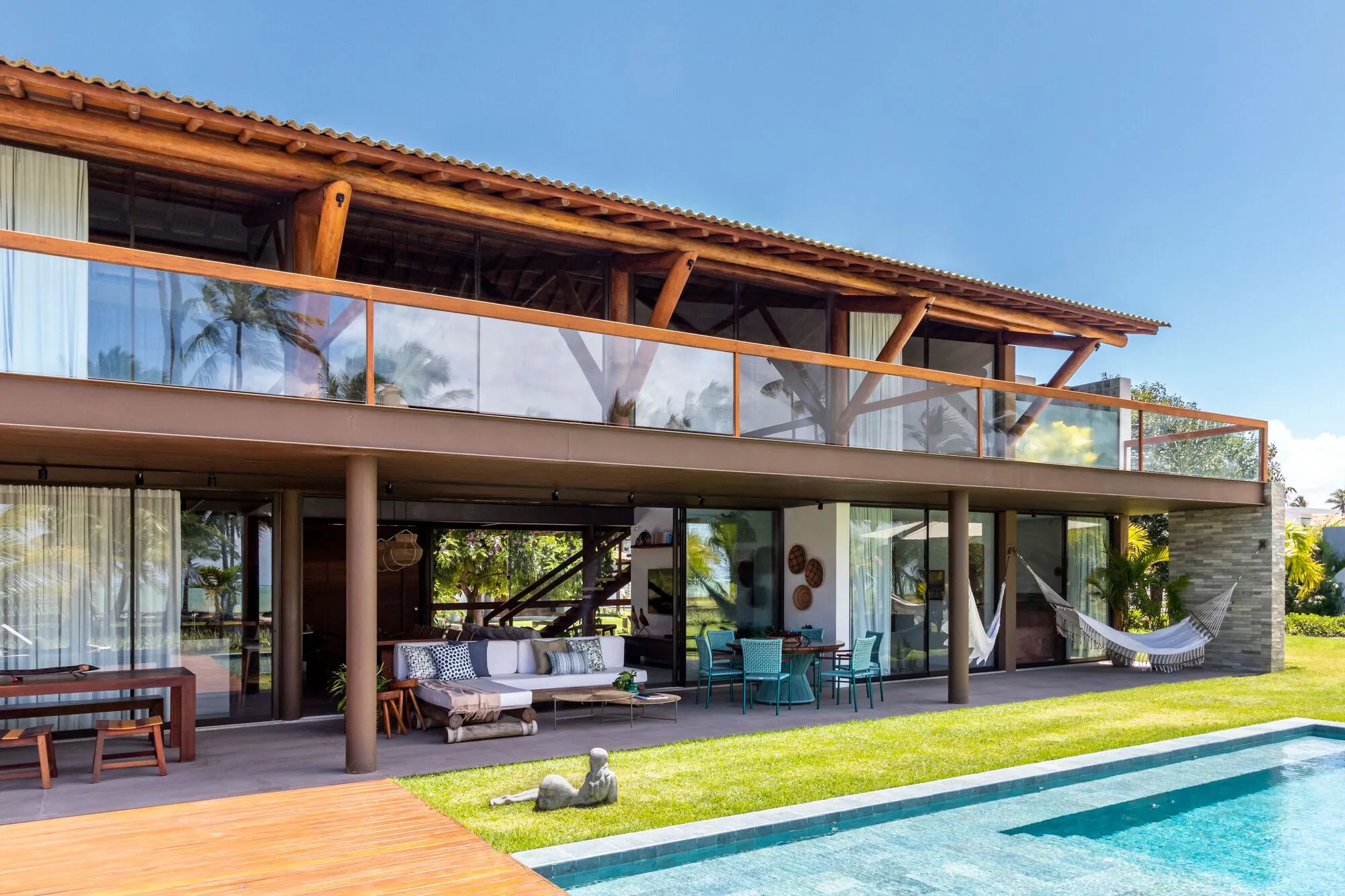Porto Neves Arquitetura Builds a Eucalyptus-Framed Beach House on the Maragogi Seafront