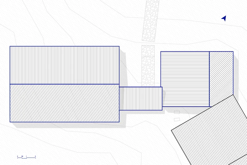 Roof plan drawing showing tile patterns and angular volumes at the building edge