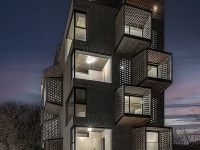Arqtipo Stacks Trapezoidal Brick Balconies into a Buenos Aires Housing Tower